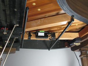 Photo of a dehumidifier installed in a baby grand.