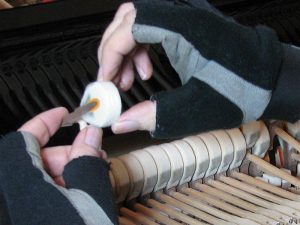 Photo of piano technician softening the felts.
